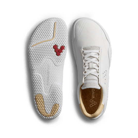 Vivobarefoot Motus Studio Leather Sneaker – Bright White with sleek design and flexible sole.