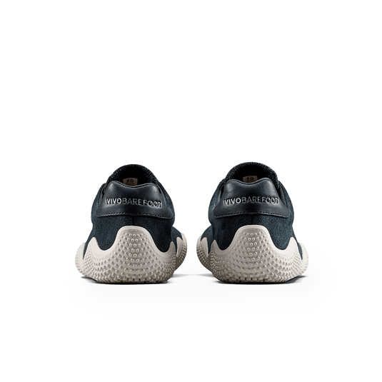 Vivobarefoot Motus Studio Sneaker | Women’s Obsidian/White back view showcasing eco-friendly design and comfort.
