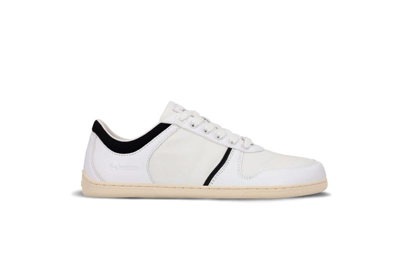 Load image into Gallery viewer, Be Lenka Echo vegan barefoot sneakers in white and black, ideal for comfort and style during city strolls.