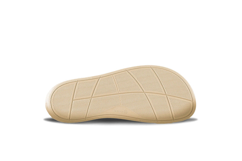 Load image into Gallery viewer, Sole of Be Lenka Echo Barefoot Sneakers in white and black, showcasing flexibility and comfort for vegan footwear.