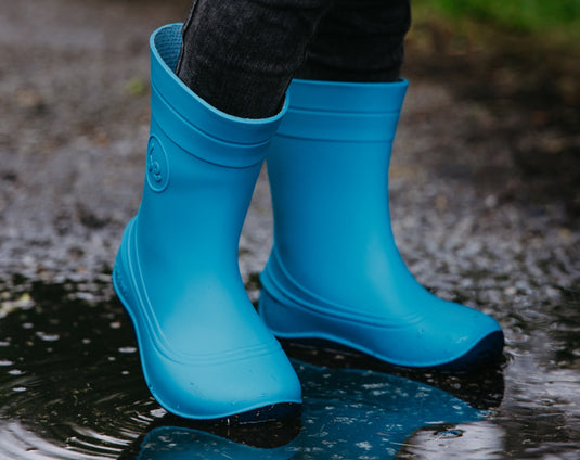 Be Lenka Kids Barefoot Rain Boots in Aqua Blue, perfect for puddle play and natural foot movement.