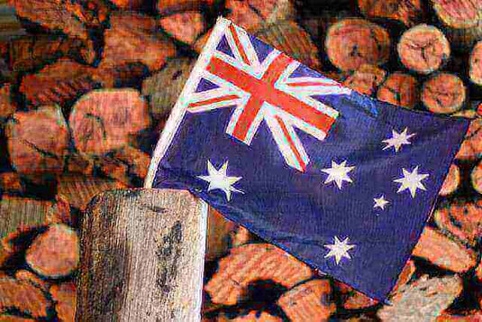 Australian flag with wood logs background, highlighting Australian-made products - Adventureco Blog
