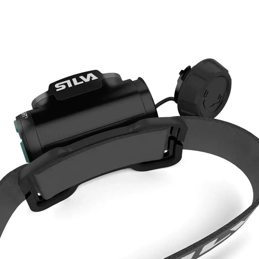 Silva Explore 4 Headlamp with waterproof design and adjustable strap, featuring multi-attachment options and three LED colors.