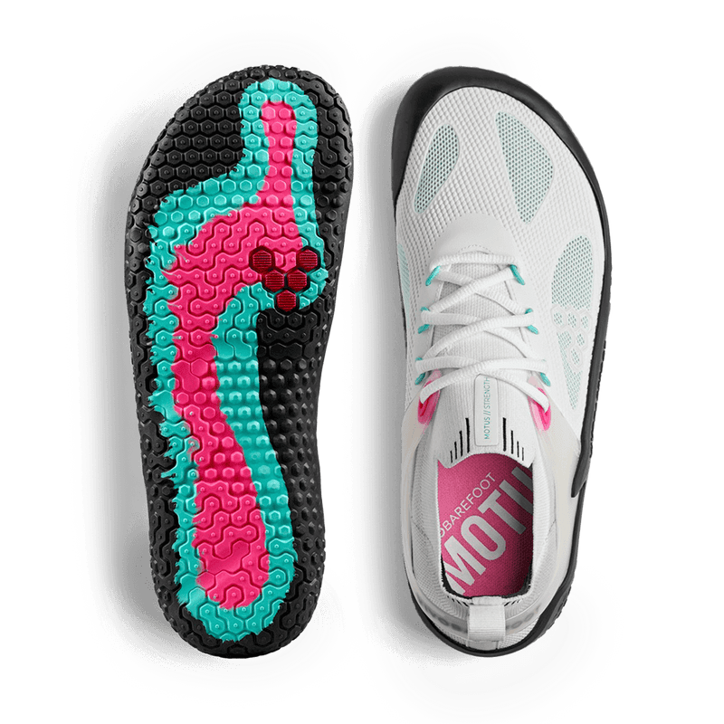 Load image into Gallery viewer, Vivobarefoot Motus Strength Womens Blue Tint performance sneakers featuring a colorful sole design for high-intensity workouts.
