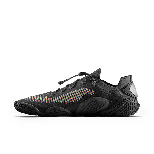 Vivobarefoot Motus Flex Womens Obsidian/Space Dye side view showcasing flexible sole and knitted upper design.