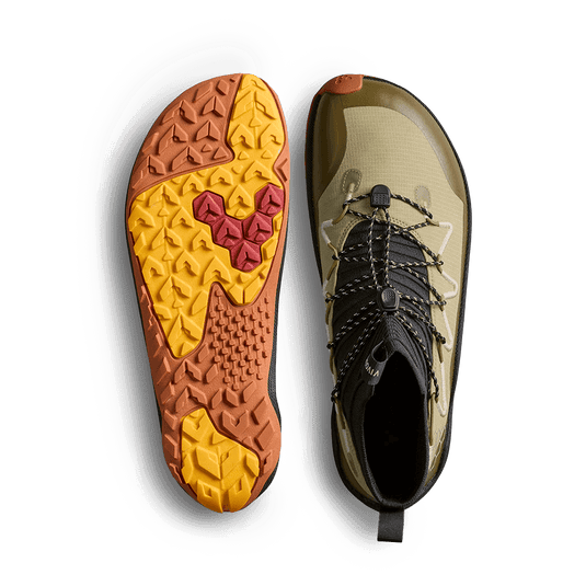 Vivobarefoot Primus Trail Flow Mid Mens Cedar footwear showing outsole and upper design for outdoor performance.