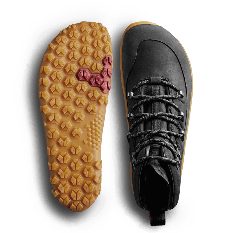 Load image into Gallery viewer, Vivobarefoot Tracker Leather AT women&#39;s boot in obsidian with a high-performance outsole, showcasing its lightweight design.
