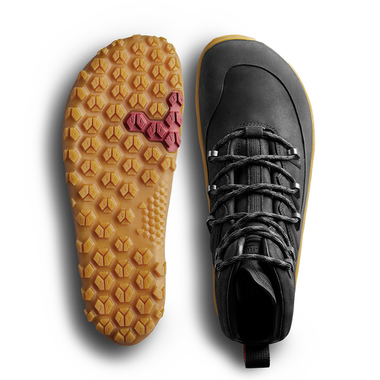 Vivobarefoot Tracker Leather AT women's boot in obsidian with a high-performance outsole, showcasing its lightweight design.