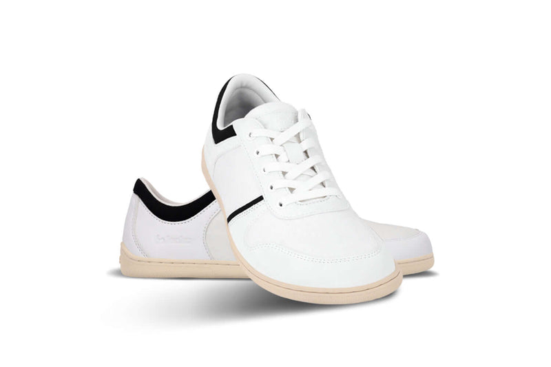 Load image into Gallery viewer, Be Lenka Echo vegan barefoot sneakers in white and black, perfect for city strolls and ultimate comfort.
