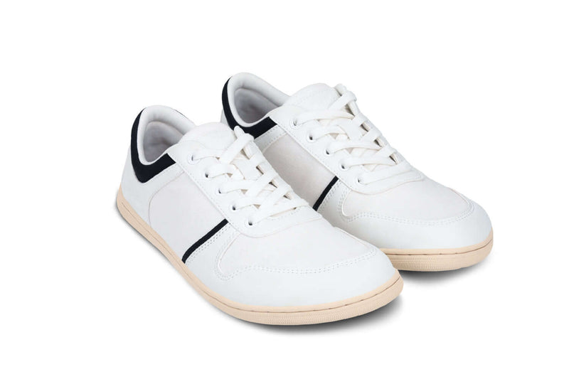 Load image into Gallery viewer, Be Lenka Echo Vegan barefoot sneakers in white and black, ideal for comfort and style during city strolls.
